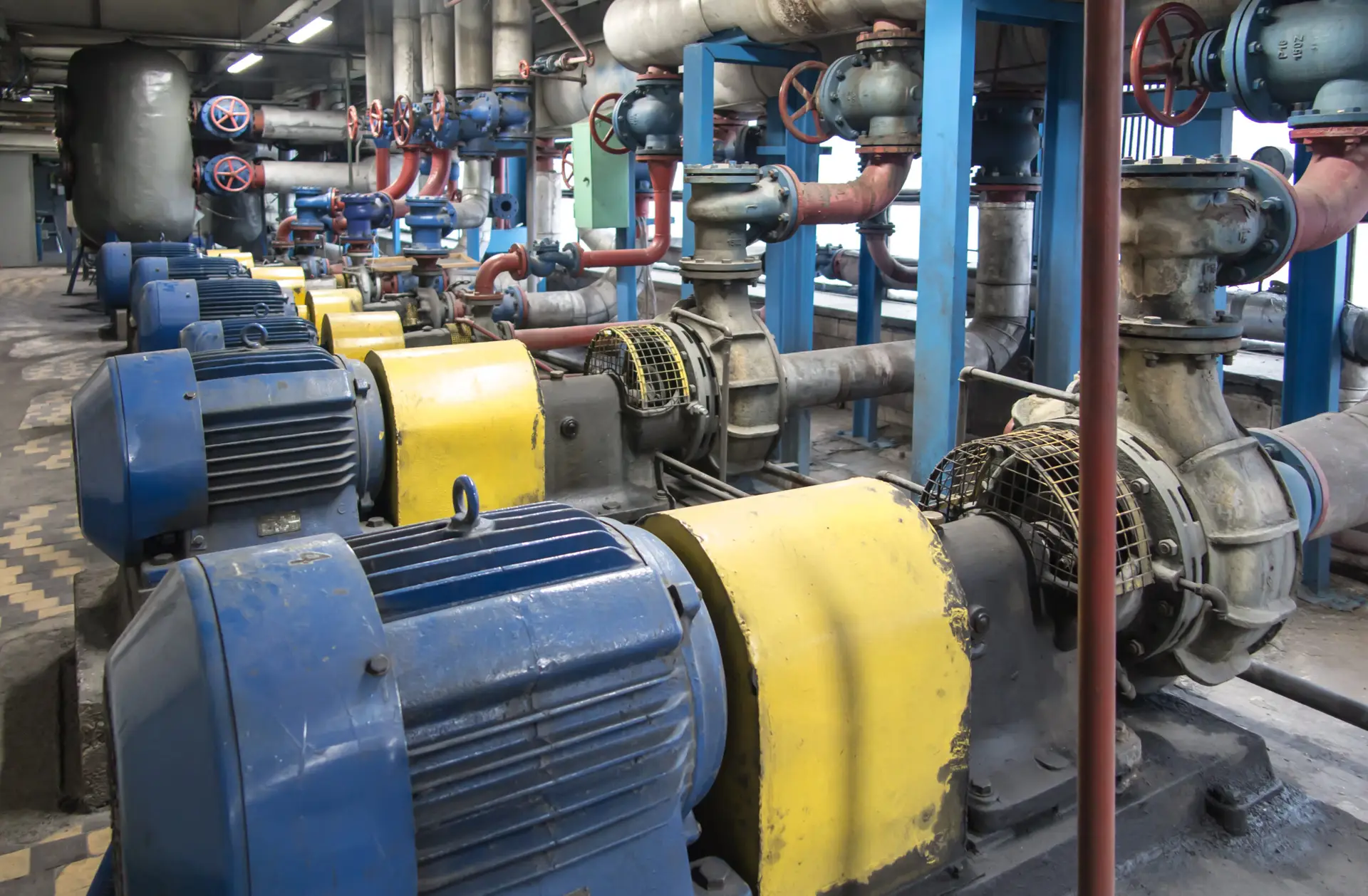 Rotating machines such as pumps installed inside a factory environment